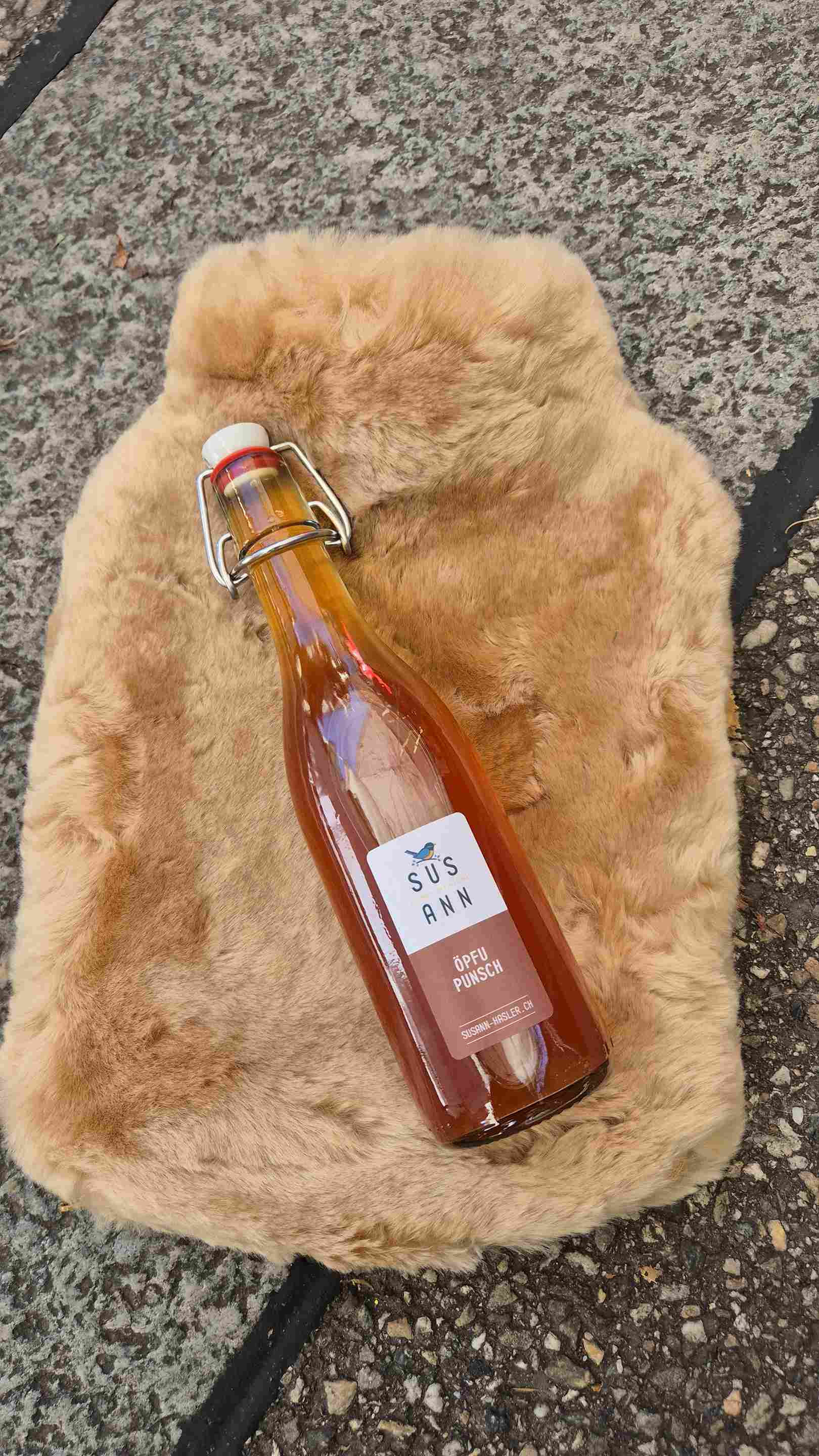 Alpaka Bettflasche mit Oepfupunsch